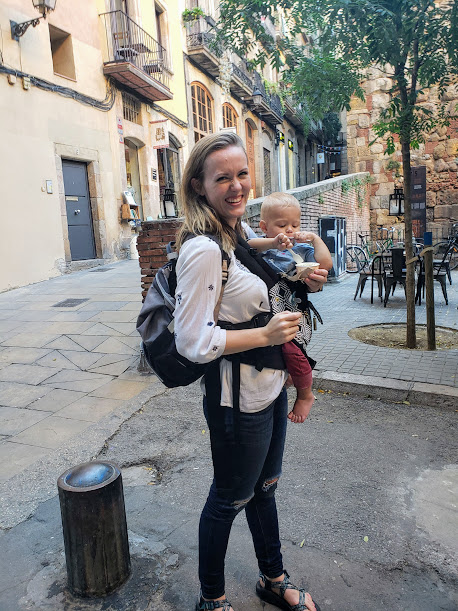 baby in baby carrier traveling