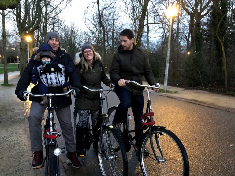 family with baby on bikes in amsterdam