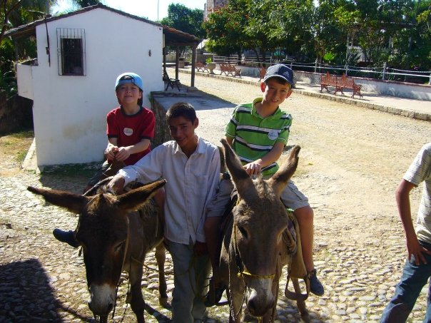 boys on donkeys in mexico