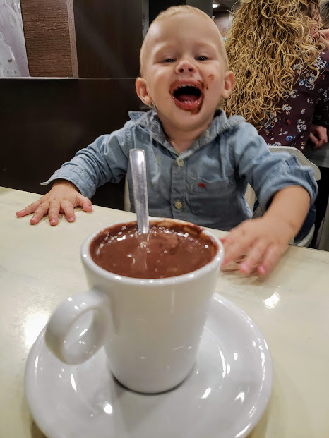 baby with hot chocolate