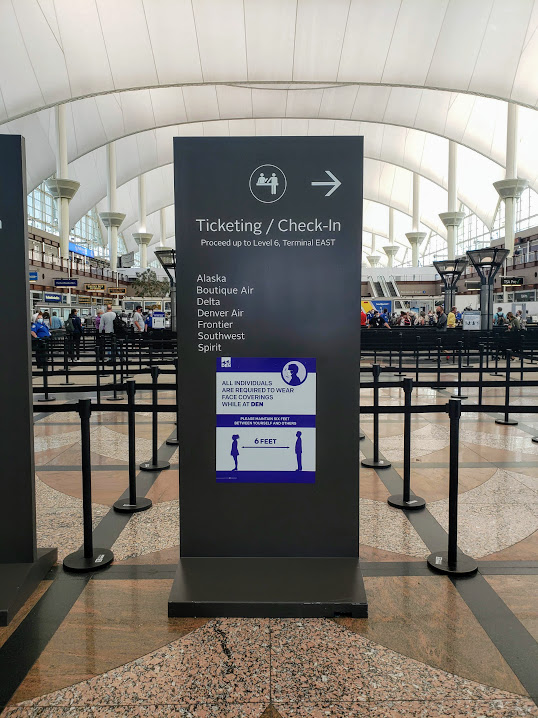 tsa social distancing sign for flying during covid
